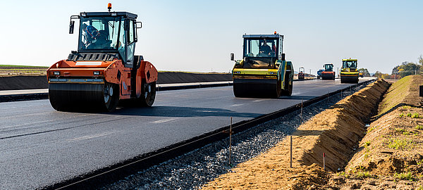 Truck, Construction Machinery, Heavy, Highway, Asphalt Paving Machine, Steamroller, Road Construction, Tar, Compactor, Rolled Up, Asphalt, Lying Down, Repairing, Working, Loading, Wheel, Tire, Physical Pressure, Beginnings, Yellow, Black Color, New, Industry, Construction Industry, Transportation, Activity, Occupation, Gravel, Steam, Street, Tractor, Conveyor Belt, Equipment, Land Vehicle, asphalting, bitumen, blacktopping, Paver Brick, pneumatic, tracked, Machinery